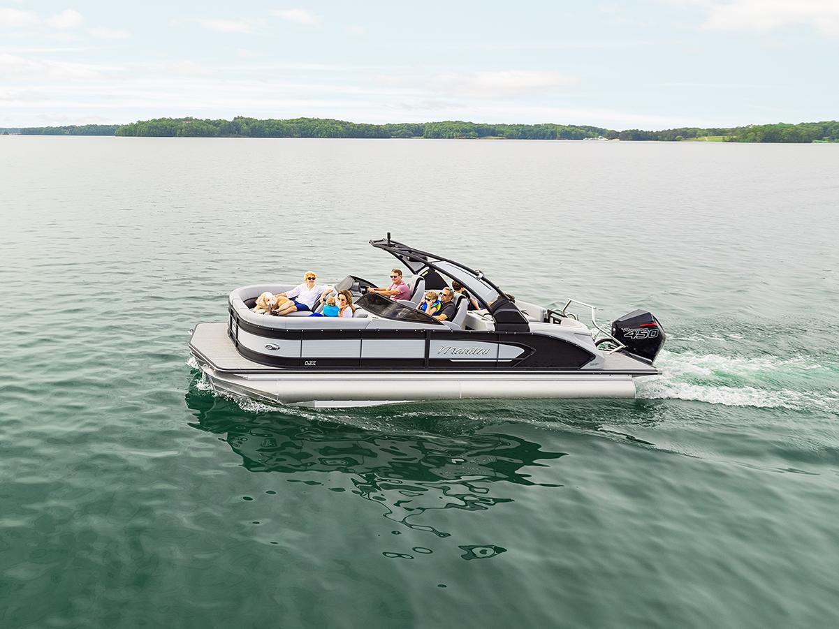 Manitou Sport LX Pontoon Boat cruising on a lake