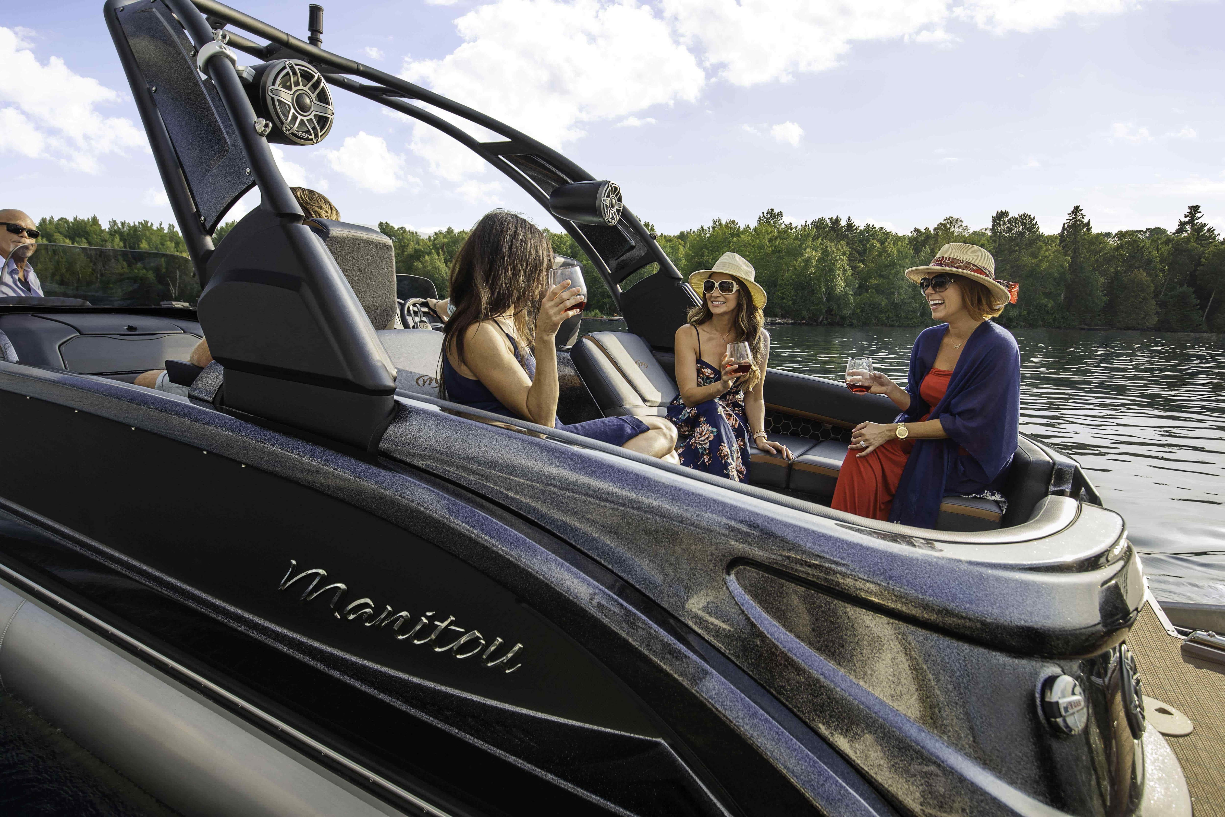 Ladies entertaining on the Manitou XT Pontoon Boat