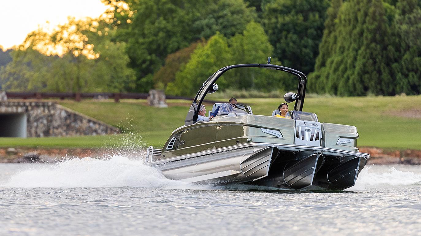 People going fast with a Manitou Pontoon Boat