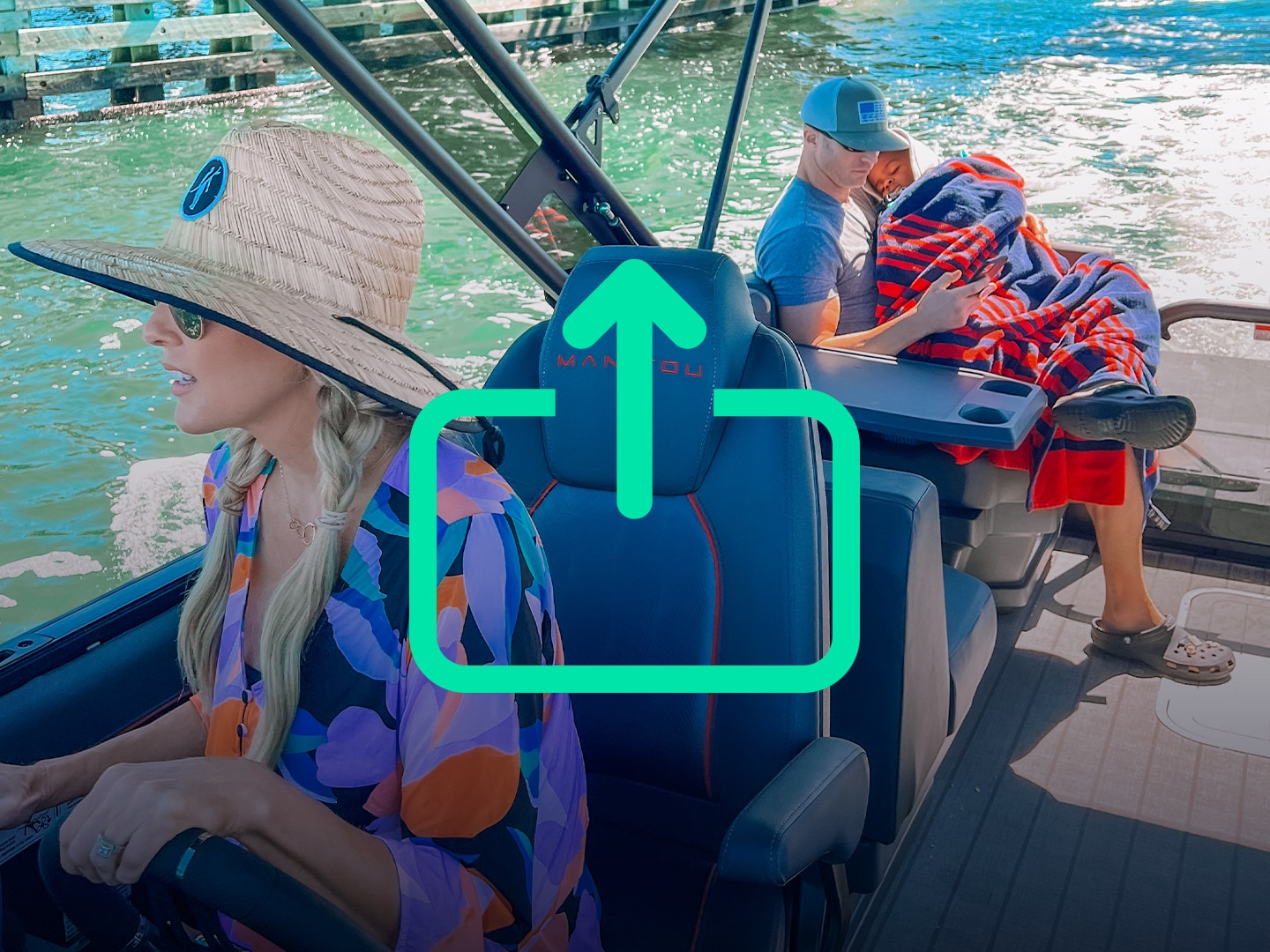 Family enjoying a peaceful ride on a Manitou pontoon boat