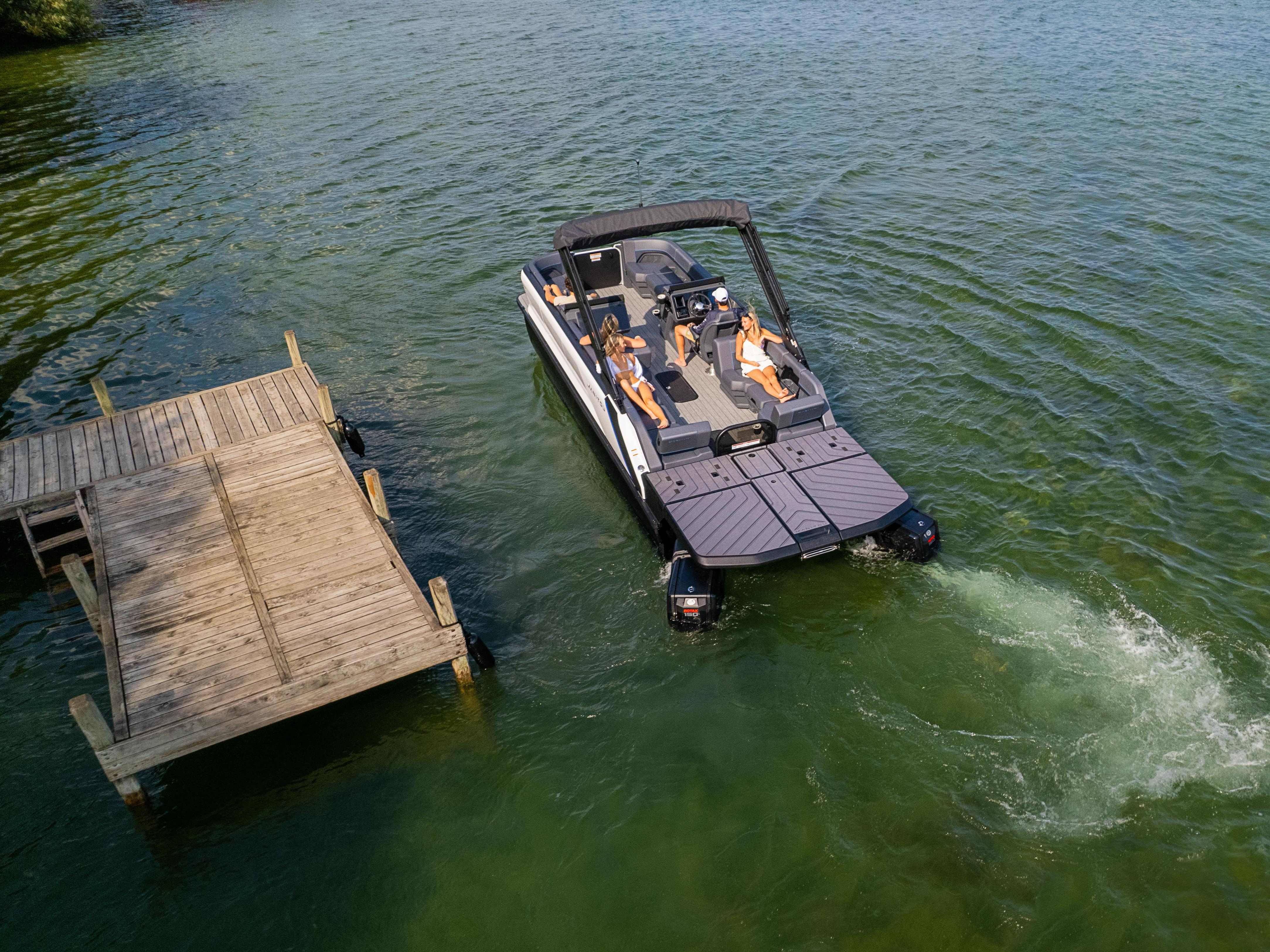 Group of friends heading on an adventure with a 2024 Manitou Explore